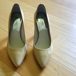 MK pumps heel 3 inch, size 7.5M new with some flow